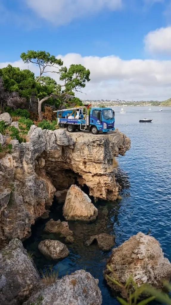 ProFlo WA vacuum gutter cleaning truck on the Swan River clifftop at Bicton Baths Perth
