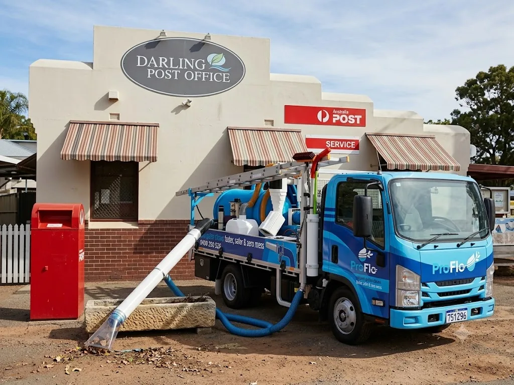 ProFlo WA vacuum gutter cleaning truck outside the historic Darlington Post Office in the Perth Hills